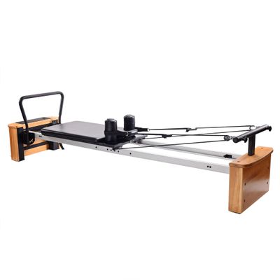 Stamina Products AeroPilates Board Reformer with Oak Wood Base Studio Grade for Home Use with Cardio Rebounder, Adjustable Foot Bar, 4 Resistance Springs, and Workout DVD, Pro XP 557