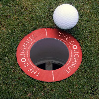 The Doughnut  Golf hole reducer, putting aid