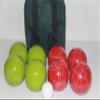 BuyBocceBalls Listing - Made in USA, Premium Quality Tournament Bocce Set - 110mm Lime Green and Dark Orange Balls, Nylon Green/Black Bag, 998 Grams (2 lbs. 3.2 oz.). Various Bag Colors view 1