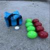 BuyBocceBalls Listing - Made in USA, Premium Quality Tournament Bocce Set - 110mm Green and Red Balls, Nylon Green/Black Bag, 998 Grams (2 lbs. 3.2 oz.). Various Bag Colors view 1