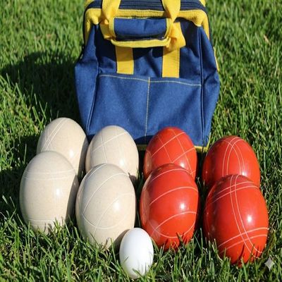 BuyBocceBalls Listing - Made in USA, Premium Quality Tournament Bocce Set - 110mm White and Red Balls, Nylon Blue/Yellow Bag, 998 Grams (2 lbs. 3.2 oz.).
