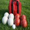 BuyBocceBalls Listing - Made in USA, Premium Quality Tournament Bocce Set - 110mm White and Dark Orange Balls, Nylon red Bag, 998 Grams (2 lbs. 3.2 oz.). Various Bag Colors view 2
