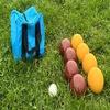 BuyBocceBalls Listing - Made in USA, Premium Quality Tournament Bocce Set - 110mm Gold and Dark Red Balls, Nylon red Bag, 998 Grams (2 lbs. 3.2 oz.). Various Bag Colors view 1