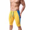 FEESHOW Men's Workout Gym Sports Fitness Running Tights Shorts Pants (Yellow, L) view 3