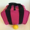 BuyBocceBalls Unique Bocce Accessories Package - Heavy Duty Nylon Bocce Bag (Pink with Black Handles) and Official Tournament-Grade Yellow 60mm Pallino view 1