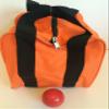 BuyBocceBalls Unique Bocce Accessories Package - Heavy Duty Nylon Bocce Bag (Orange with Black Handles) and Official Tournament-Grade Red 60mm Pallino view 1