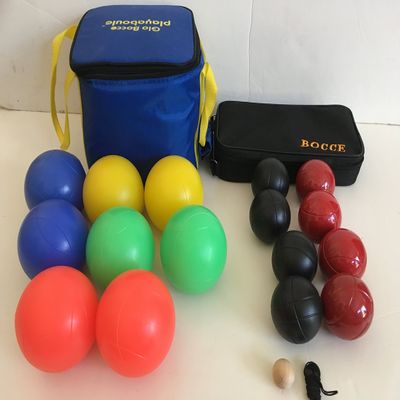 BuyBocceBalls Unique Package - Glow in Dark Bocce Set and - 73mm Metal Bocce/Petanque - 8 Ball Set with 4 Black and 4 red Balls and Black Bag