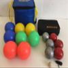 BuyBocceBalls Unique Package - Glow in Dark Bocce Set and 73mm Metal Petanque/Boules 6 Ball Set with 3 Striped Grind Sand and 3 red Balls and Black Bag view 1
