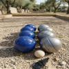 BuyBocceBalls Listing -73mm Metal Bocce/Petanque 8 Ball Set with 4 Striped Grind Sand and 4 Blue Balls and Blue Bag view 2
