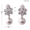 Grace Jun Bridal Luxury Platinum Plated CZ With Simulated Pearl Flower Shape Clip on Earrings No Pierced Earrings Ear Clip view 2
