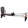 Stamina Products AeroPilates Pro 565 Pilates Reformer with Oak Wood Base  Studio Grade for Home Use with Cardio Rebounder, Adjustable Foot Bar, 4 Resistance Springs, and Workout DVD view 1