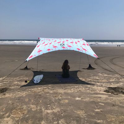 Neso Grande Portable Beach Tent Sun Shelter - Lightweight Beach Shade Canopy - Easy Setup for Family Outings - Patented Reinforced Corners - UPF 50+ Sun Protection - 7ft Tall, 9 x 9ft - Flamingos