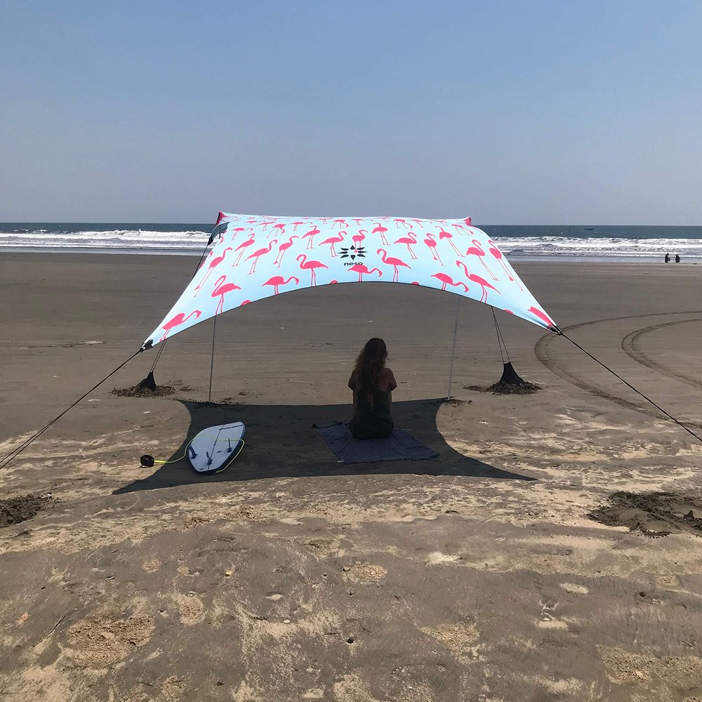 Neso Grande Portable Beach Tent Sun Shelter - Lightweight Beach Shade Canopy - Easy Setup for Family Outings - Patented Reinforced Corners - UPF 50+ Sun Protection - 7ft Tall, 9 x 9ft - Flamingos