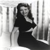Ann Miller wearing a cut out dress Photo Print (8 x 10) view 1