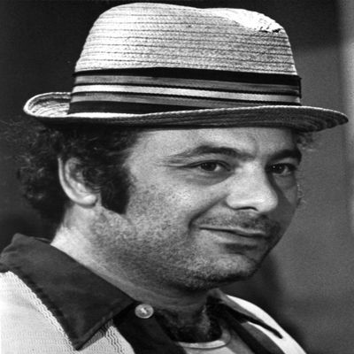 Burt Young wearing a straw hat Photo Print (8 x 10)