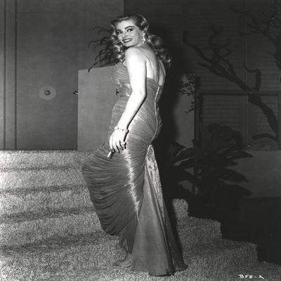 Anita Ekberg sitting in Classic Photo Print (8 x 10)