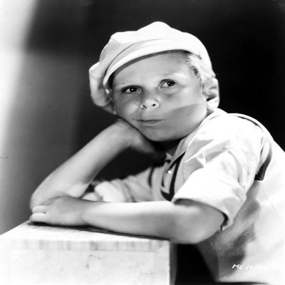 A Jackie Cooper wearing a flat cap Photo Print (24 x 30)