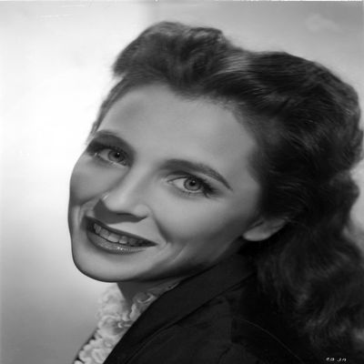 Carla Balenda in a Suit with Red Cape Photo Print (8 x 10)