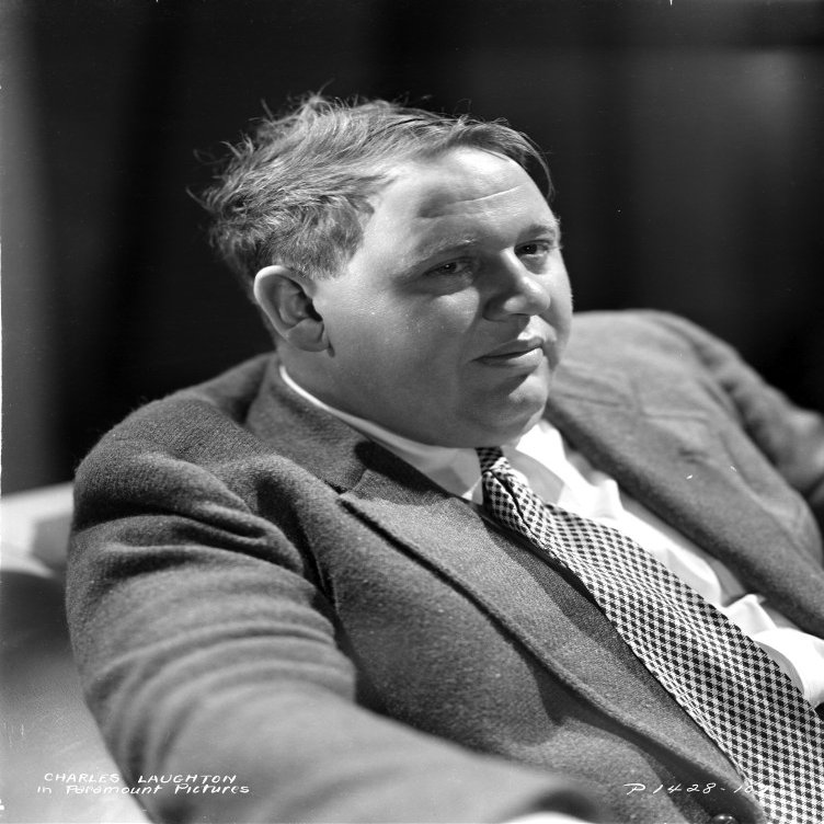 Charles Laughton sitting in Classic Photo Print (8 x 10)