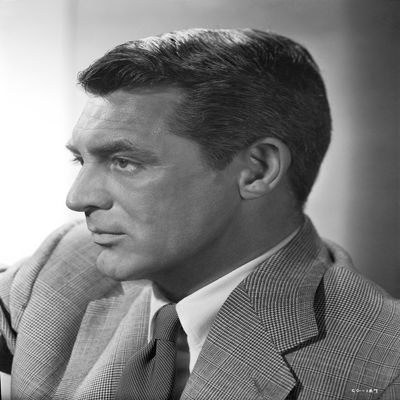 Cary Grant Side view Pose in Printed Suit and Necktie Photo Print (8 x 10)