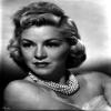 Claire Trevor Looking Away in White with Necklace Photo Print (8 x 10) view 1