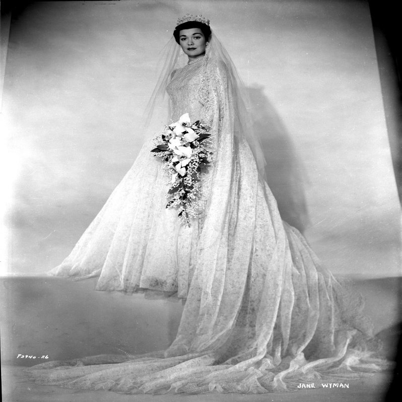Jane Wyman Posed in White Silk Long Sleeve Wedding Dress and Long Sheer Veil Photo Print (24 x 30)