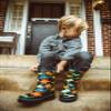 Western Chief Boys Waterproof Printed Rain Boot with Easy Pull on Handles - Dino World, 4 M US Big Kid view 2