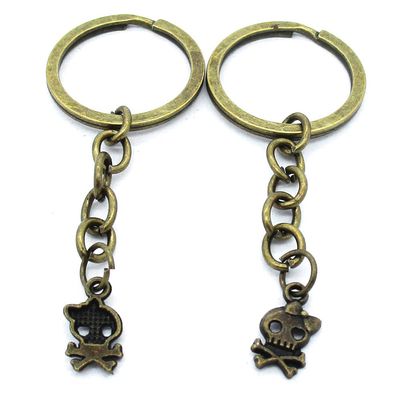 100 Items Keychain Keyring Key Tags Chains Rings Jewelry Bag Charms AA441 Female Lady Skull Girl