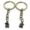 100 Items Keychain Keyring Key Tags Chains Rings Jewelry Bag Charms AA441 Female Lady Skull Girl