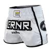 Combat Corner CRNR Muay Thai Shorts | Kickboxing Thai Boxing MMA Training Competition Athletic Shorts | White/Black | Youth Medium view 1