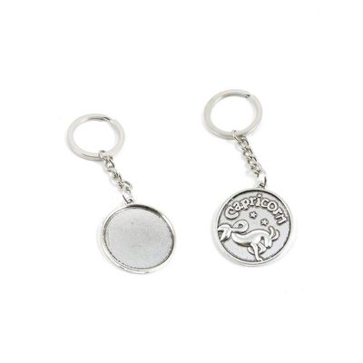 1 PCS Antique Silver Keyrings Keychains Key Ring Chains Tags Clasps E7HR5 Capricorn Round Cabochon Base