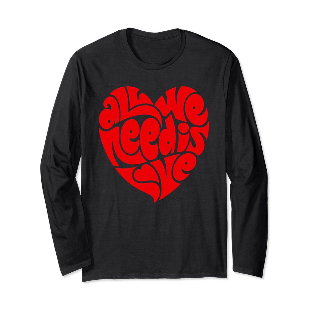A cute "All we need is Love" Tee That is shaped like a heart
