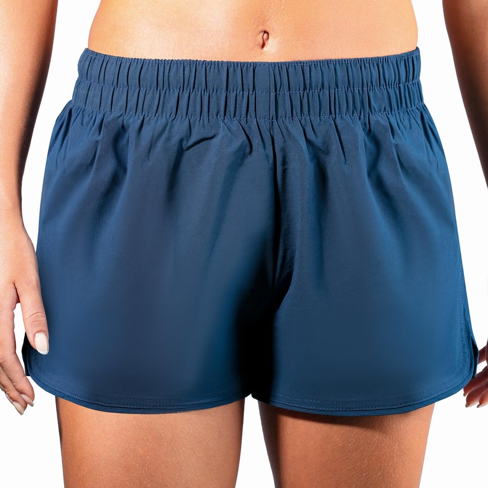 Kanu Surf Women's Stretch UPF 50+ Active Swim and Workout Boardshort, Lori Solid Blue, X-Large