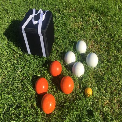 BuyBocceBalls Listing - Unique Bocce Set - 107mm with Orange and White Balls, Black Bag