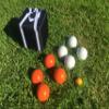 BuyBocceBalls Listing - Unique Bocce Set - 107mm with Orange and White Balls, Black Bag view 1