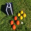 BuyBocceBalls Listing - Unique Bocce Set - 107mm with Orange and Yellow Balls, Black Bag view 1