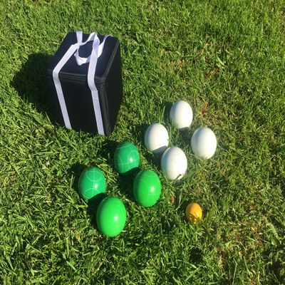 BuyBocceBalls Listing - Unique Bocce Set - 107mm with Green and White Balls, Black Bag