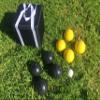 BuyBocceBalls Listing - Unique Bocce Set - 107mm with Black and Yellow Balls, Black Bag view 1