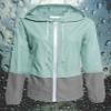 Avoogue Lightweight Raincoat Women's Waterproof Windbreaker Packable Outdoor Hooded Rain Jacket Light Blue XXL view 2
