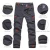 JOMLUN Boy's Fleece Lined Hiking Pants Waterproof Windproof Warm Soft Shell Outdoor Cargo Pants Snow Ski Walking Trousers view 4