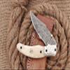 HUNTEX Custom Handmade Hand-Forged Rain Drop Pattern Damascus Steel 4 Inch Long Natural Camel Bone Handle Razor Sharp Camping Hunting Folding Pocket Knife with Genuine Leather Pouch view 4