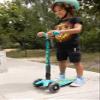 Micro Kickboard - Maxi Deluxe Foldable LED - Three Wheeled, Lean-to-Steer, Fold-to-Carry Swiss-Designed Micro Scooter for Kids with Motion-Activated Light-Up Wheels for Ages 5-12 (Petrol Green) view 2