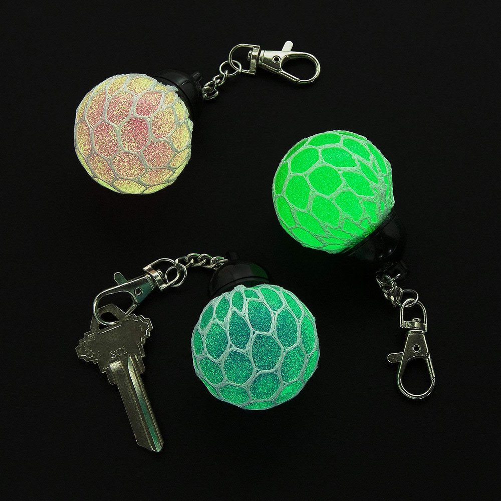 Fun Express Glow-in-the-Dark Mesh-Covered Squeeze Ball Backpack Clips  Fun & Stress-Relieving Party Favors Accessories for Kids School Supplies & Gifts  Perfect for Backpacks & Keychains  12 Pieces