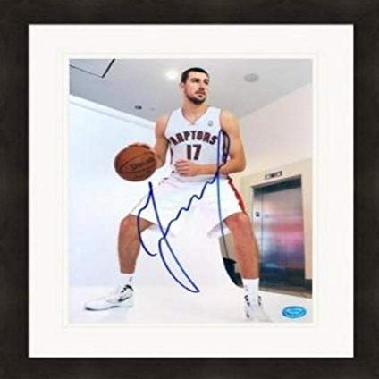 Autograph Warehouse 388629 8 x 10 in. Jonas Valanciunas Autographed Matted & Framed Photo - Toronto Raptors44; Lithuanian Image No.MJG1