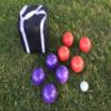 BuyBocceBalls Listing - Unique Bocce Set - 107mm with Purple and Red Balls, Black Bag view 1