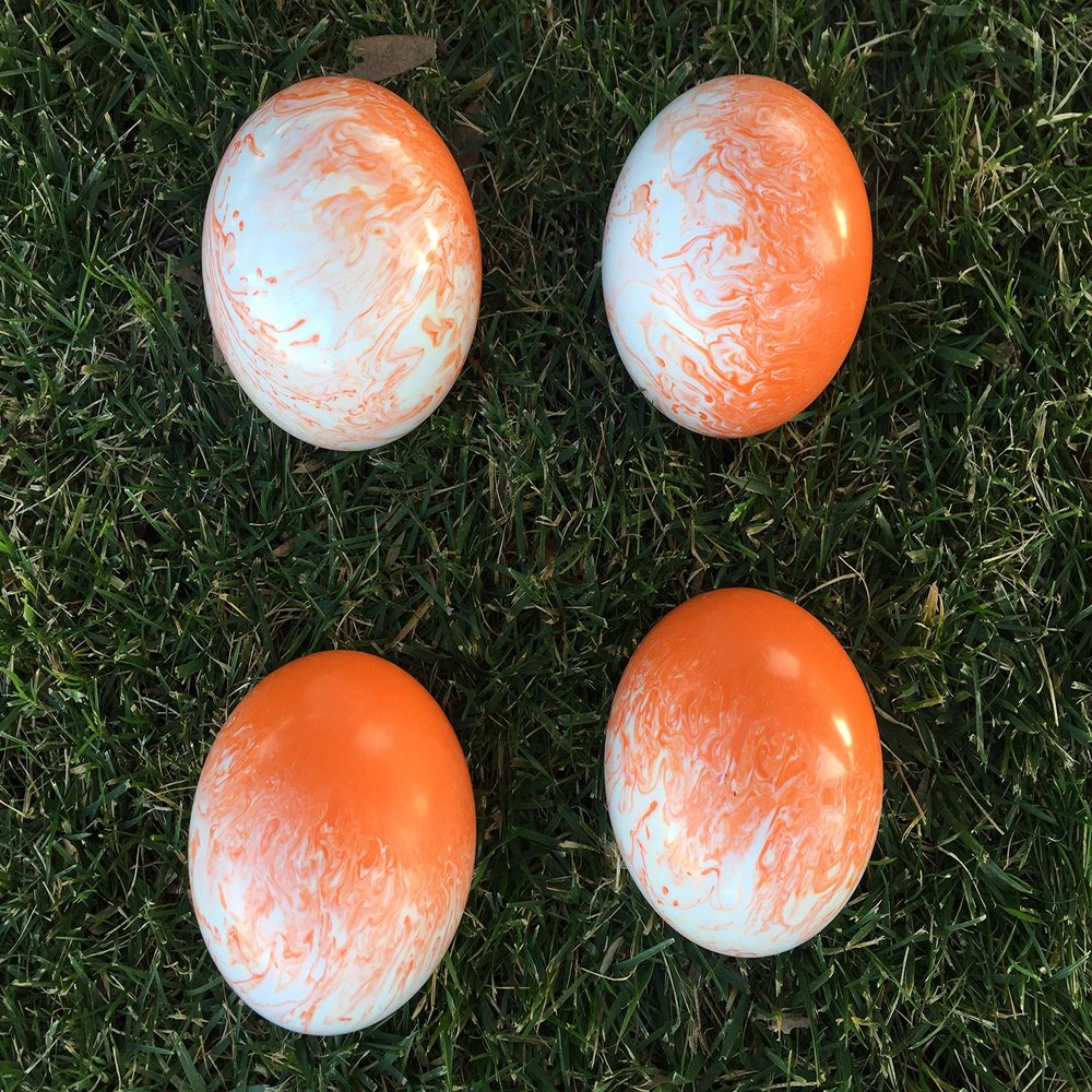 BuyBocceBalls Unique Bocce Package - 4 Pack of 107mm Marbleized Orange and White Balls