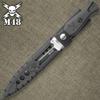 M48 Highland Sgian with Sheath | 5 1/4" Black Oxide-Coated Cast Stainless Steel Blade | Three Through-Holes | Contoured Black TPR Handle | Molded Vortec Sheath with Nylon Strap | 9 1/2" Overall view 3