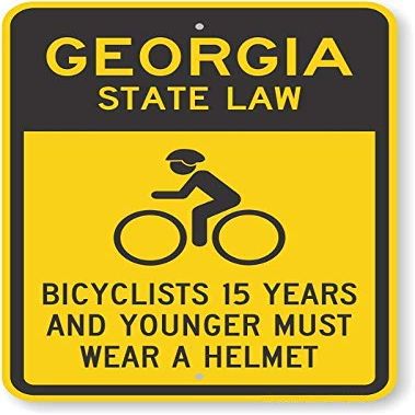 The Sign Studio - 18 x 24  Georgia State Law Bike Sign: Bicyclists 15 Years and Younger Must Wear A Helmet (with Cyclists Symbol)