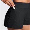 CRZ YOGA Women's Lightweight Mid Rise Hiking Shorts 4'' - Stretch for Athletic Summer Travel Outdoor Golf with Zip Pockets Black Medium view 3