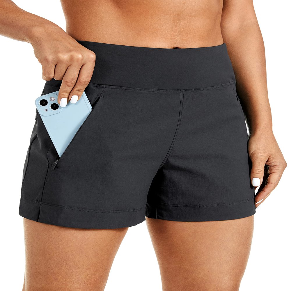 CRZ YOGA Women's Lightweight Mid Rise Hiking Shorts 4'' - Stretch for Athletic Summer Travel Outdoor Golf with Zip Pockets Ink Gray Medium